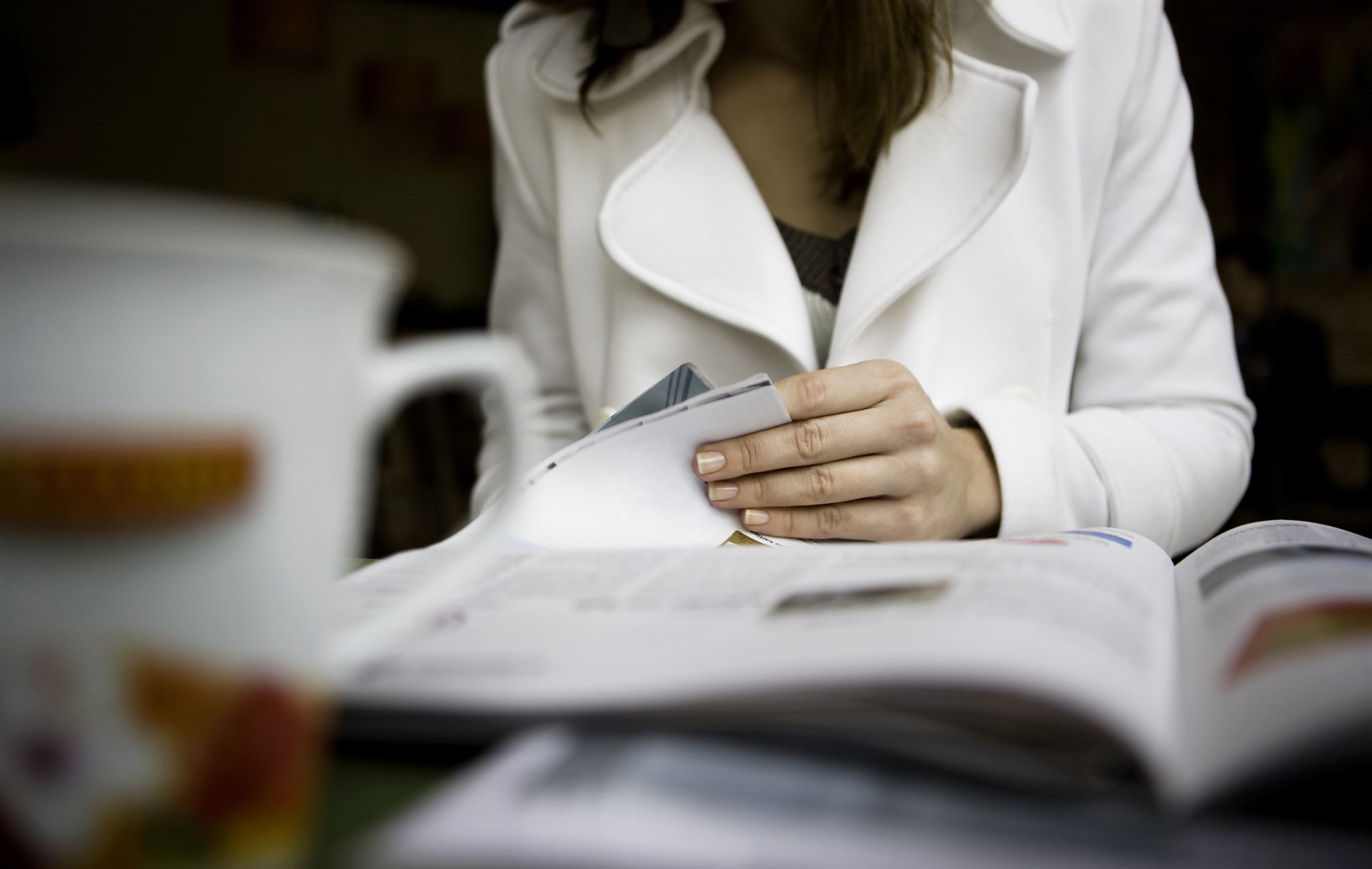 Person reading an article